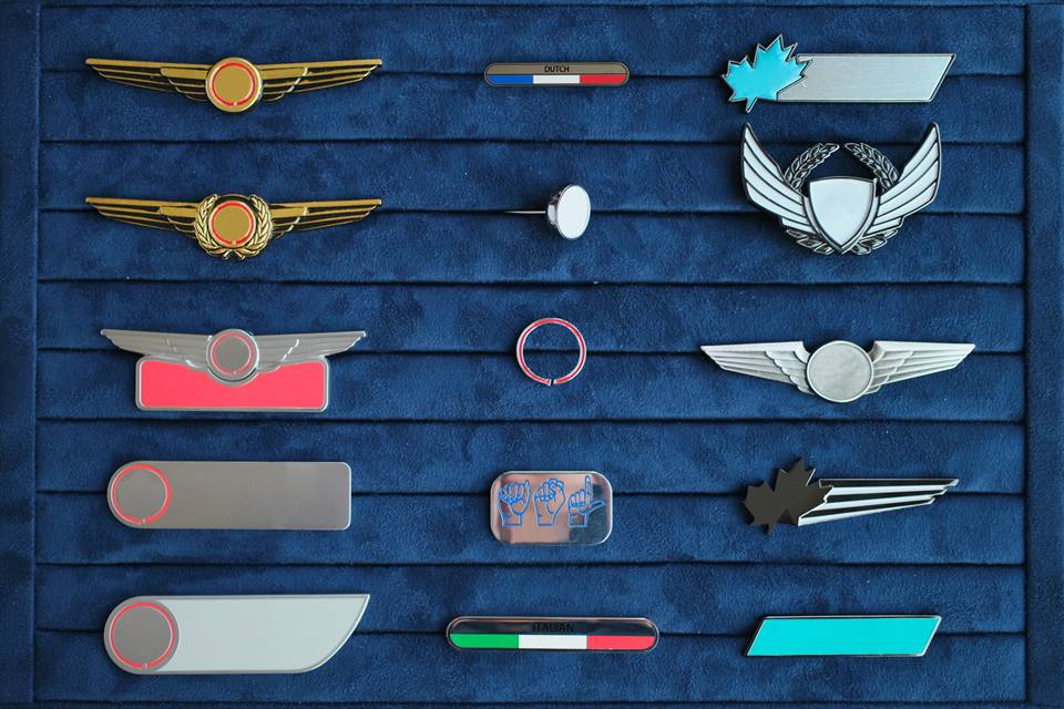 Airline and hospitality nameplates and insignia